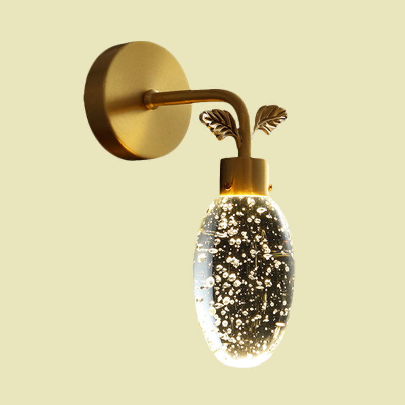 LED Wall Sconce Lighting Fixture Modern Oval Clear Seeded Crystal Bedroom Wall Light in Gold with Leaf Design Clearhalo 'Cast Iron' 'Glass' 'Industrial' 'Modern wall lights' 'Modern' 'Tiffany' 'Traditional wall lights' 'Wall Lamps & Sconces' 'Wall Lights' Lighting' 736893