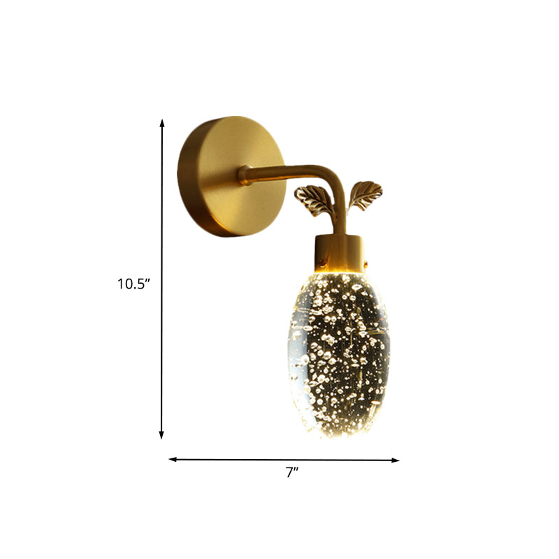LED Wall Sconce Lighting Fixture Modern Oval Clear Seeded Crystal Bedroom Wall Light in Gold with Leaf Design Clearhalo 'Cast Iron' 'Glass' 'Industrial' 'Modern wall lights' 'Modern' 'Tiffany' 'Traditional wall lights' 'Wall Lamps & Sconces' 'Wall Lights' Lighting' 736894