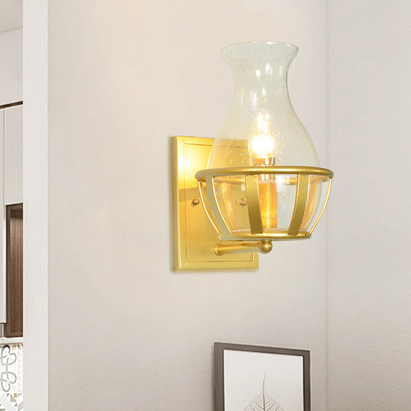Vase Clear Glass Sconce Light Fixture Postmodern 1 Light Gold Wall Mounted Lamp with Basket Base Clearhalo 'Cast Iron' 'Glass' 'Industrial' 'Modern wall lights' 'Modern' 'Tiffany' 'Traditional wall lights' 'Wall Lamps & Sconces' 'Wall Lights' Lighting' 737116