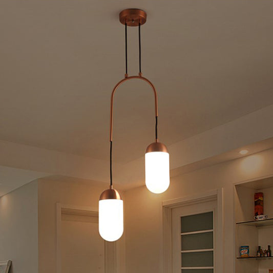 Post Modern Capsule Multi Ceiling Light White Glass 2 Lights Bedside Arced Pendant Lamp in Copper Clearhalo 'Ceiling Lights' 'Glass shade' 'Glass' 'Modern Pendants' 'Modern' 'Pendant Lights' 'Pendants' Lighting' 737156