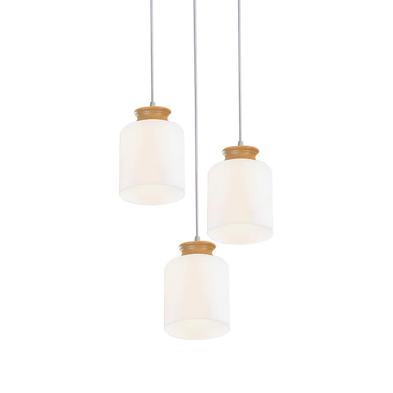 Cylinder Multi Light Chandelier Modern White Glass 3 Heads Wood Suspension Lamp with Round/Linear Canopy Clearhalo 'Ceiling Lights' 'Glass shade' 'Glass' 'Modern Pendants' 'Modern' 'Pendant Lights' 'Pendants' Lighting' 737166