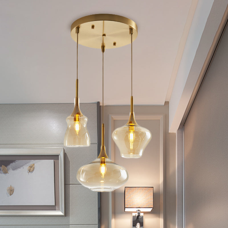 Clear/Cognac Glass Wavy Multi Ceiling Light Modernism 3 Bulbs Gold Hanging Pendant Lamp Clearhalo 'Ceiling Lights' 'Glass shade' 'Glass' 'Modern Pendants' 'Modern' 'Pendant Lights' 'Pendants' Lighting' 737183