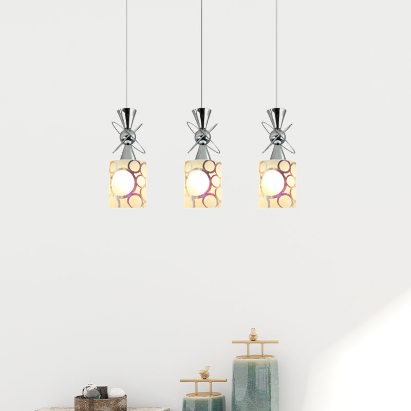 Metal Hourglass Multi Pendant Modernist 3-Bulb Chrome Ceiling Light with Cylinder Patterned Glass Shade, Linear/Round Canopy Clearhalo 'Ceiling Lights' 'Glass shade' 'Glass' 'Modern Pendants' 'Modern' 'Pendant Lights' 'Pendants' Lighting' 737194