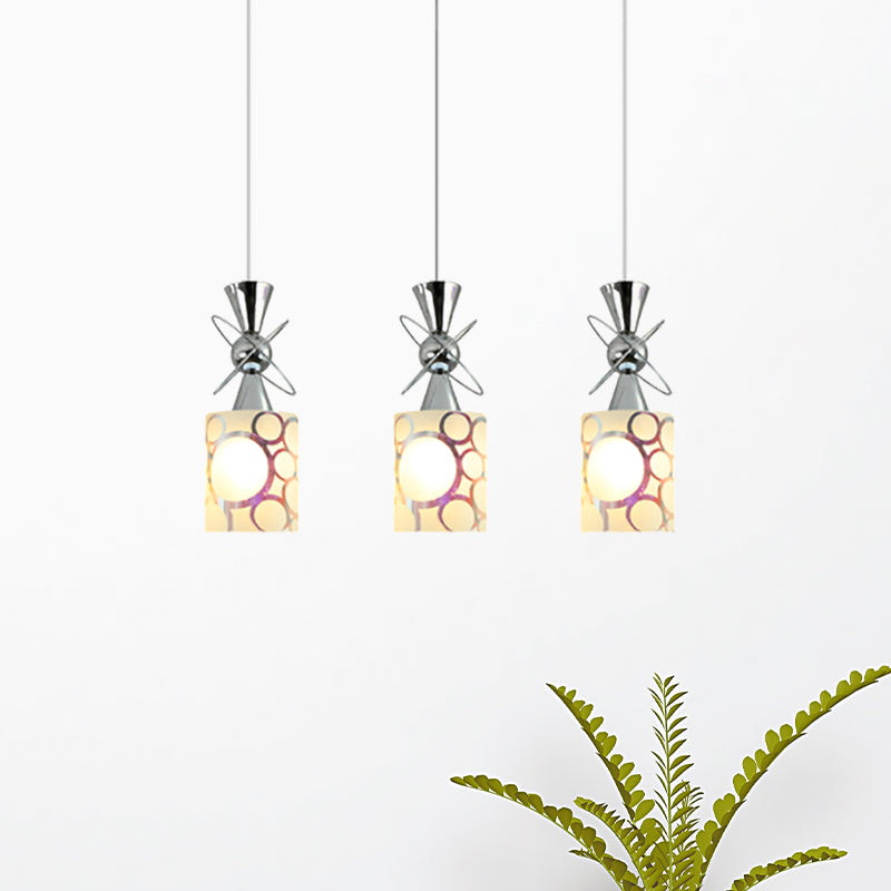 Metal Hourglass Multi Pendant Modernist 3-Bulb Chrome Ceiling Light with Cylinder Patterned Glass Shade, Linear/Round Canopy Clearhalo 'Ceiling Lights' 'Glass shade' 'Glass' 'Modern Pendants' 'Modern' 'Pendant Lights' 'Pendants' Lighting' 737195