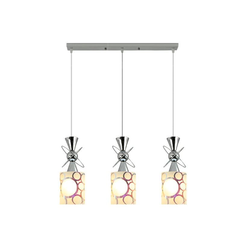 Metal Hourglass Multi Pendant Modernist 3-Bulb Chrome Ceiling Light with Cylinder Patterned Glass Shade, Linear/Round Canopy Clearhalo 'Ceiling Lights' 'Glass shade' 'Glass' 'Modern Pendants' 'Modern' 'Pendant Lights' 'Pendants' Lighting' 737196