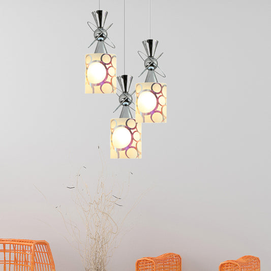 Metal Hourglass Multi Pendant Modernist 3-Bulb Chrome Ceiling Light with Cylinder Patterned Glass Shade, Linear/Round Canopy Chrome Round Clearhalo 'Ceiling Lights' 'Glass shade' 'Glass' 'Modern Pendants' 'Modern' 'Pendant Lights' 'Pendants' Lighting' 737198