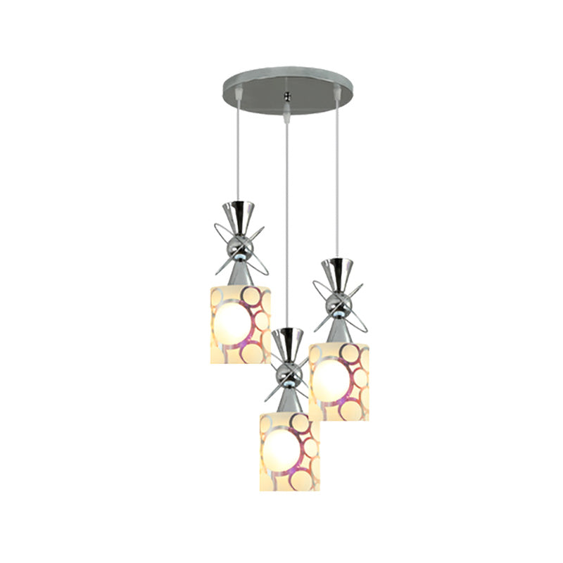 Metal Hourglass Multi Pendant Modernist 3-Bulb Chrome Ceiling Light with Cylinder Patterned Glass Shade, Linear/Round Canopy Clearhalo 'Ceiling Lights' 'Glass shade' 'Glass' 'Modern Pendants' 'Modern' 'Pendant Lights' 'Pendants' Lighting' 737200