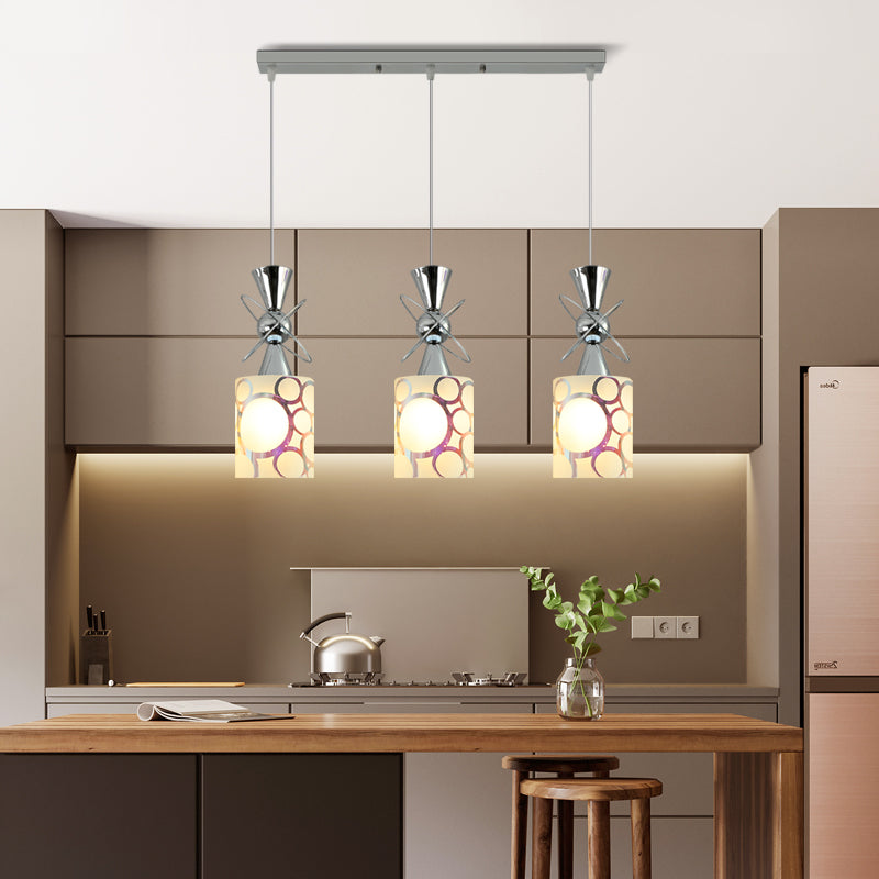 Metal Hourglass Multi Pendant Modernist 3-Bulb Chrome Ceiling Light with Cylinder Patterned Glass Shade, Linear/Round Canopy Chrome Linear Clearhalo 'Ceiling Lights' 'Glass shade' 'Glass' 'Modern Pendants' 'Modern' 'Pendant Lights' 'Pendants' Lighting' 737202