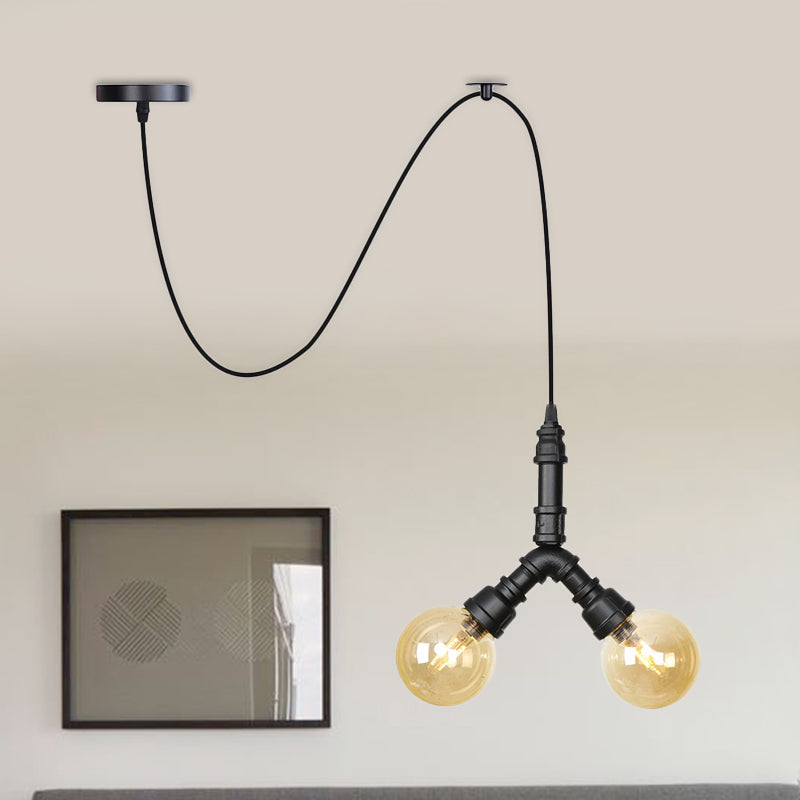 Amber Glass Black Pendant Chandelier Spherical/Capsule 2 Heads Antiqued Suspension Lamp with Swag Design Clearhalo 'Ceiling Lights' 'Chandeliers' 'Glass shade' 'Glass' 'Industrial Chandeliers' 'Industrial' 'Middle Century Chandeliers' 'Pendant Lights' 'Tiffany' Lighting' 737515