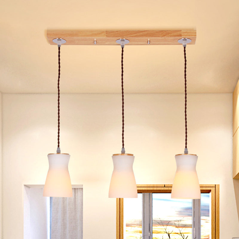 Milk Can Multi Ceiling Light Modernism White Glass 3 Lights Dining Room Hanging Lamp Kit in Wood Clearhalo 'Ceiling Lights' 'Modern Pendants' 'Modern' 'Pendant Lights' 'Pendants' Lighting' 738243