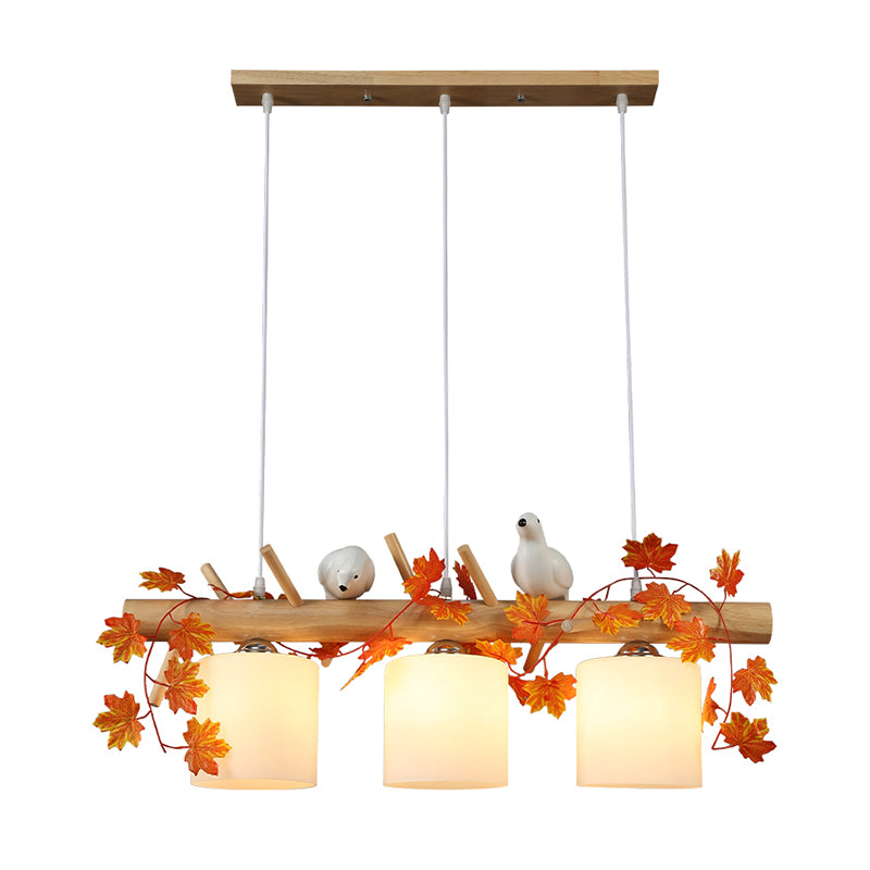 Ivory Glass Wood Island Light Cylinder 2/3 Bulbs Industrial Pendant Lamp with Maple/Green Leaf and Bird Decor Clearhalo 'Ceiling Lights' 'Close To Ceiling Lights' 'Glass shade' 'Glass' 'Island Lights' Lighting' 740393