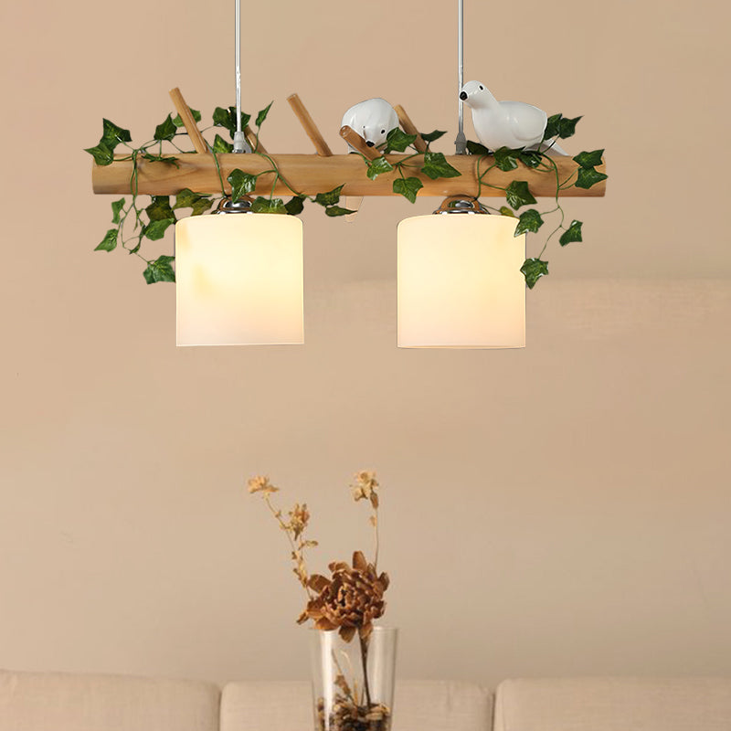 Ivory Glass Wood Island Light Cylinder 2/3 Bulbs Industrial Pendant Lamp with Maple/Green Leaf and Bird Decor 2 Wood Clearhalo 'Ceiling Lights' 'Close To Ceiling Lights' 'Glass shade' 'Glass' 'Island Lights' Lighting' 740396