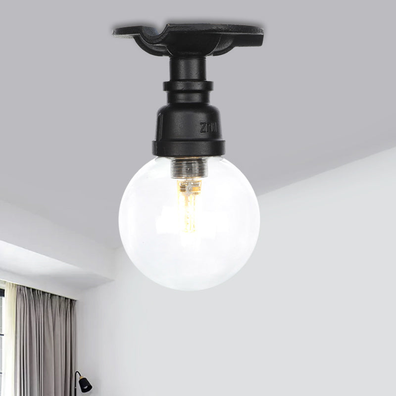 Orb Clear Glass Semi Flush Lighting Industrial 1 Bulb Restaurant Ceiling Mounted Fixture in Black Clearhalo 'Ceiling Lights' 'Close To Ceiling Lights' 'Close to ceiling' 'Glass shade' 'Glass' 'Semi-flushmount' Lighting' 754067