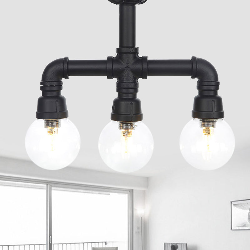 Industrial-Style Orb Semi Flush Light 3/4 Lights Clear Glass LED Flushmount Lamp in Black Black B Clearhalo 'Ceiling Lights' 'Close To Ceiling Lights' 'Close to ceiling' 'Glass shade' 'Glass' 'Semi-flushmount' Lighting' 754123