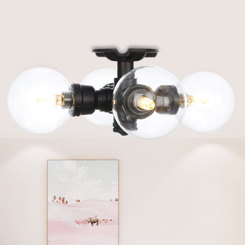 Industrial-Style Orb Semi Flush Light 3/4 Lights Clear Glass LED Flushmount Lamp in Black Black C Clearhalo 'Ceiling Lights' 'Close To Ceiling Lights' 'Close to ceiling' 'Glass shade' 'Glass' 'Semi-flushmount' Lighting' 754128