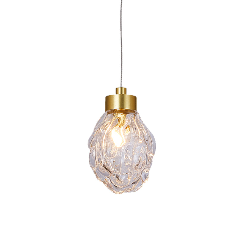 Post Modern Pineal Fruit Ceiling Light Clear Glass 1 Head Dining Room Suspension Pendant Lamp in Gold Clearhalo 'Ceiling Lights' 'Glass shade' 'Glass' 'Modern Pendants' 'Modern' 'Pendant Lights' 'Pendants' Lighting' 756989