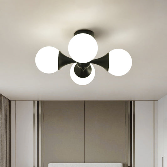 Black Finish Ball Semi Mount Lighting Modernist 4 Bulbs Milk White Glass Flush Ceiling Lamp Clearhalo 'Ceiling Lights' 'Close To Ceiling Lights' 'Close to ceiling' 'Glass shade' 'Glass' 'Semi-flushmount' Lighting' 757165