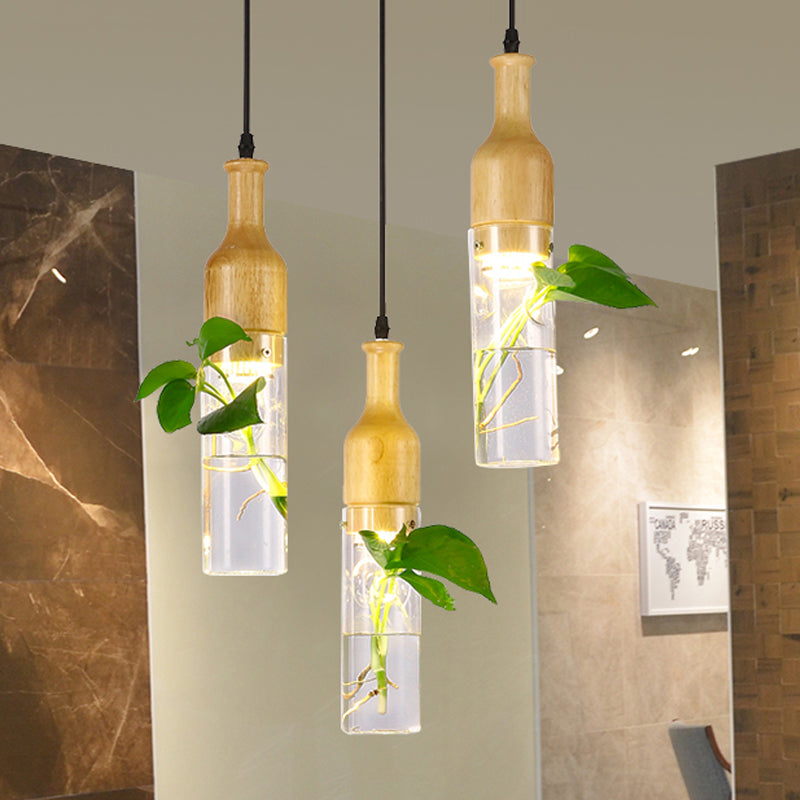 Wine Bottle Clear Glass Pendant Art Deco 1 Bulb Bedroom Plant Ceiling Hang Fixture in Wood Wood Clearhalo 'Ceiling Lights' 'Close To Ceiling Lights' 'Glass shade' 'Glass' 'Pendant Lights' 'Pendants' Lighting' 757955