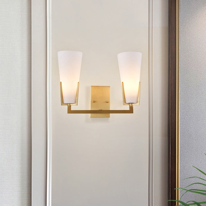Cone Bedside Sconce Lighting White Glass 2 Bulbs Post Modern Wall Mounted Lamp in Brass Brass Clearhalo 'Cast Iron' 'Glass' 'Industrial' 'Modern wall lights' 'Modern' 'Tiffany' 'Traditional wall lights' 'Wall Lamps & Sconces' 'Wall Lights' Lighting' 759045