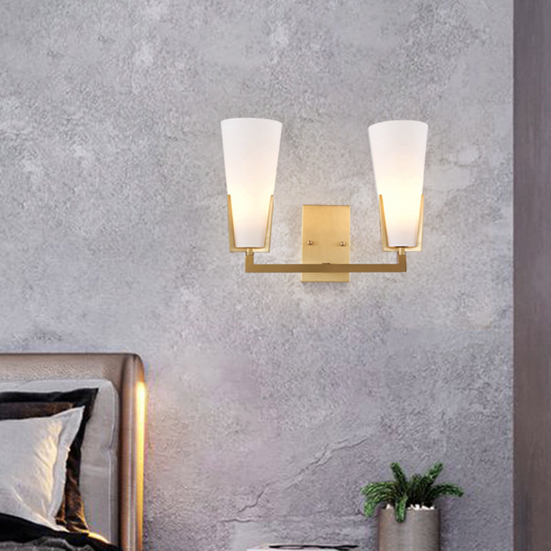 Cone Bedside Sconce Lighting White Glass 2 Bulbs Post Modern Wall Mounted Lamp in Brass Clearhalo 'Cast Iron' 'Glass' 'Industrial' 'Modern wall lights' 'Modern' 'Tiffany' 'Traditional wall lights' 'Wall Lamps & Sconces' 'Wall Lights' Lighting' 759046