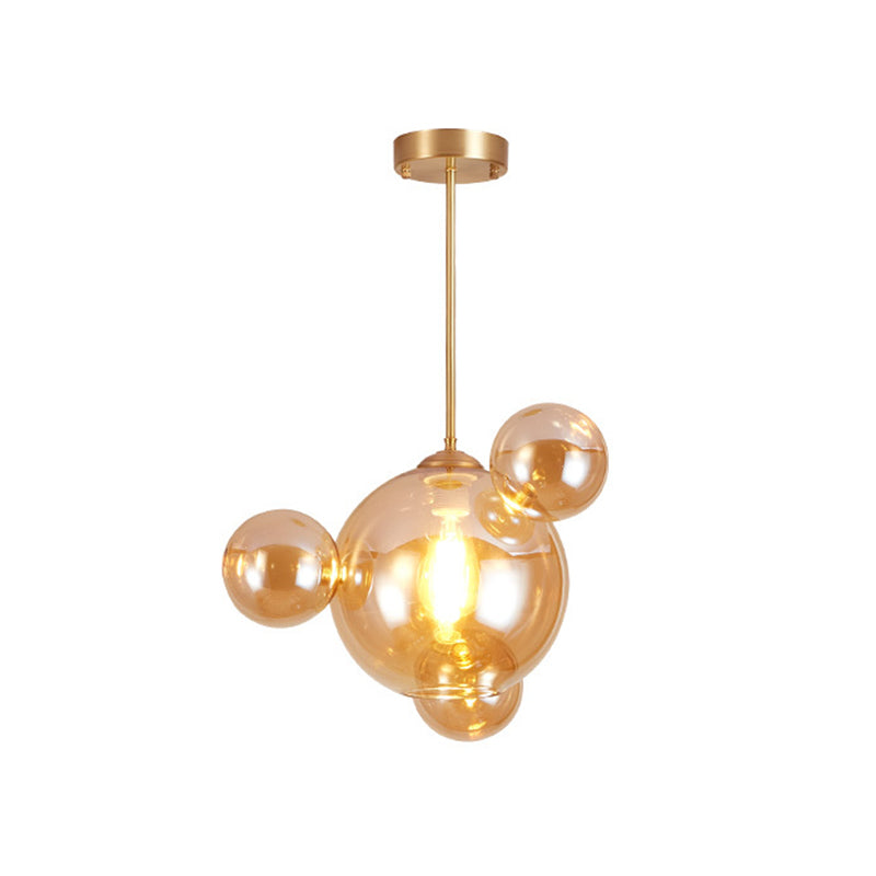 Amber Glass Bubble Shape Pendant Modernist 1 Light Hanging Lamp Kit over Dining Table Clearhalo 'Ceiling Lights' 'Close To Ceiling Lights' 'Glass shade' 'Glass' 'Modern Pendants' 'Modern' 'Pendant Lights' 'Pendants' Lighting' 759066