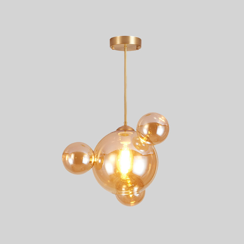 Amber Glass Bubble Shape Pendant Modernist 1 Light Hanging Lamp Kit over Dining Table Clearhalo 'Ceiling Lights' 'Close To Ceiling Lights' 'Glass shade' 'Glass' 'Modern Pendants' 'Modern' 'Pendant Lights' 'Pendants' Lighting' 759067