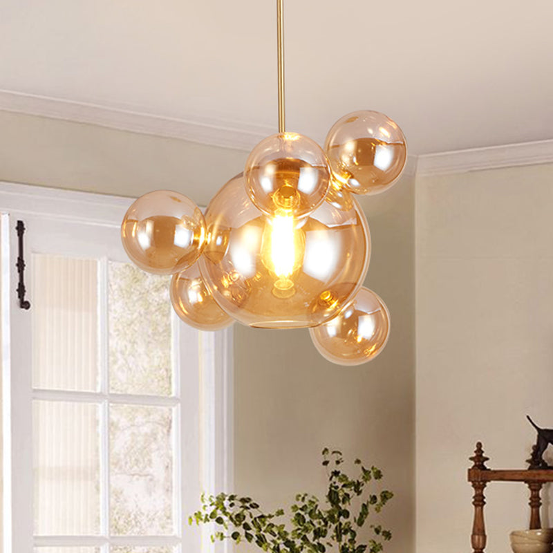 Amber Glass Bubble Shape Pendant Modernist 1 Light Hanging Lamp Kit over Dining Table Amber A Clearhalo 'Ceiling Lights' 'Close To Ceiling Lights' 'Glass shade' 'Glass' 'Modern Pendants' 'Modern' 'Pendant Lights' 'Pendants' Lighting' 759069