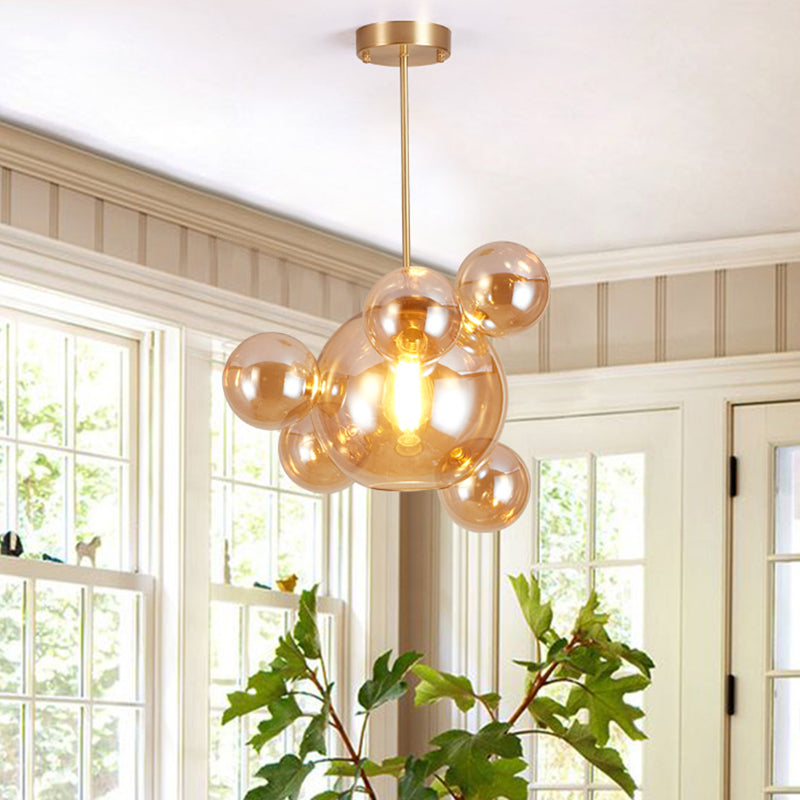 Amber Glass Bubble Shape Pendant Modernist 1 Light Hanging Lamp Kit over Dining Table Clearhalo 'Ceiling Lights' 'Close To Ceiling Lights' 'Glass shade' 'Glass' 'Modern Pendants' 'Modern' 'Pendant Lights' 'Pendants' Lighting' 759070