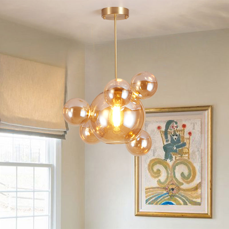 Amber Glass Bubble Shape Pendant Modernist 1 Light Hanging Lamp Kit over Dining Table Clearhalo 'Ceiling Lights' 'Close To Ceiling Lights' 'Glass shade' 'Glass' 'Modern Pendants' 'Modern' 'Pendant Lights' 'Pendants' Lighting' 759071