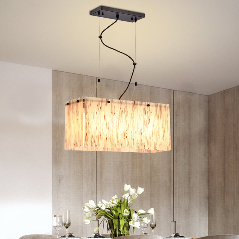 4-Head Dining Room Island Light Fixture Modern Black Ceiling Pendant Lamp with Rectangle Amber Glass Shade Amber Clearhalo 'Ceiling Lights' 'Glass shade' 'Glass' 'Island Lights' 'Pendant Lights' Lighting' 759156