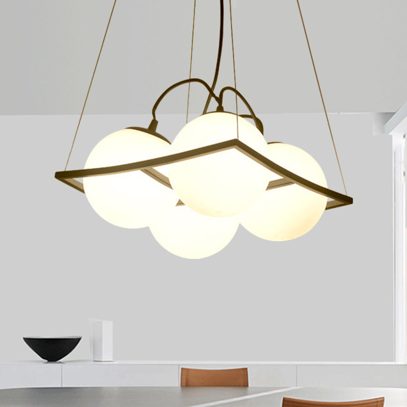 Globe Multi Light Pendant Modernist Frosted Glass 3/4 Lights Black Frame Ceiling Hang Fixture Clearhalo 'Ceiling Lights' 'Modern Pendants' 'Modern' 'Pendant Lights' 'Pendants' Lighting' 759207