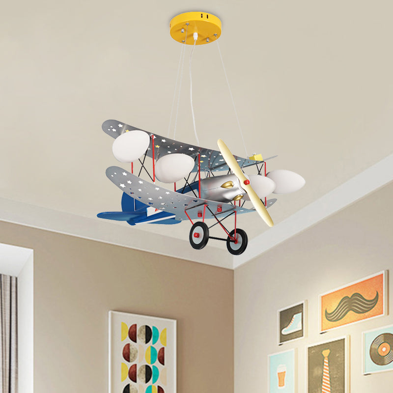 Iron Fighter Aircraft Hanging Light Kid 4-Bulb Blue Chandelier Lamp with Oval Ivory Glass Shade Blue Clearhalo 'Ceiling Lights' 'Chandeliers' Lighting' options 760383_e28aa154-e9e3-43b4-bbce-086787fde1c5