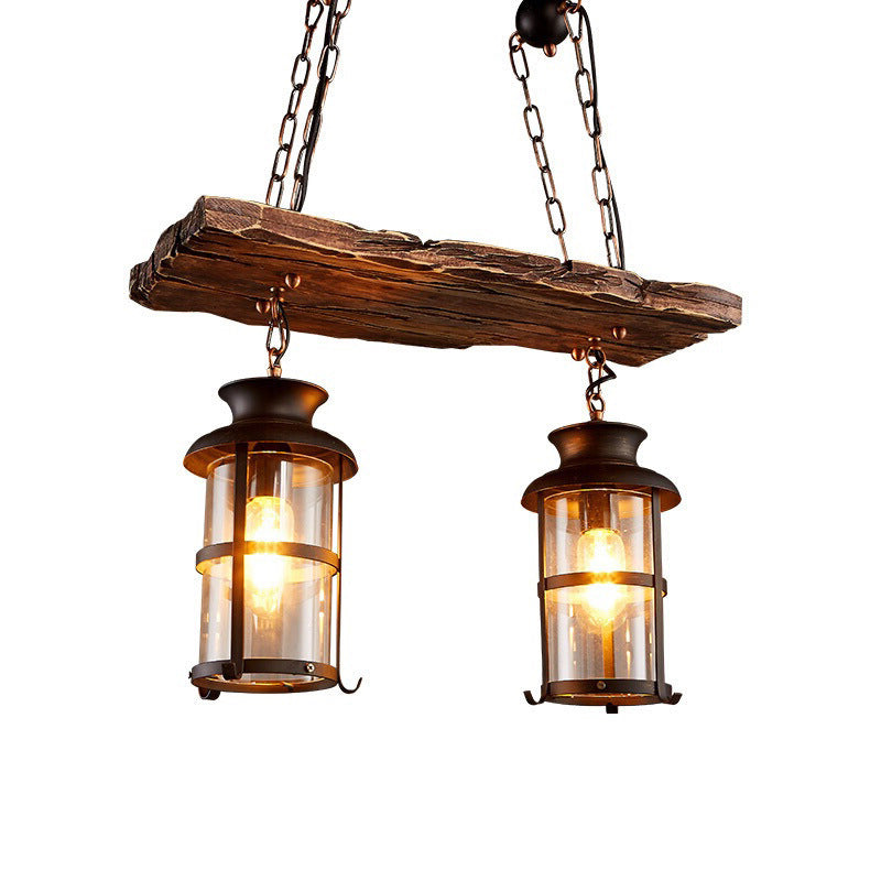 Clear Glass Lantern Island Pendant Light Industrial 2/3 Lights Bar Hanging Lamp in Black with Wood Decoration and Cage Clearhalo 'Ceiling Lights' 'Island Lights' Lighting' 764340