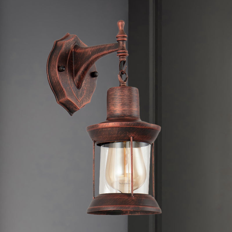 Lantern Clear Glass Wall Mounted Lamp Industrial Single Bulb Bathroom Sconce Light in Antique Copper Weathered Copper Clearhalo 'Art deco wall lights' 'Cast Iron' 'Glass' 'Industrial wall lights' 'Industrial' 'Middle century wall lights' 'Modern' 'Rustic wall lights' 'Tiffany' 'Traditional wall lights' 'Wall Lamps & Sconces' 'Wall Lights' Lighting' 768130