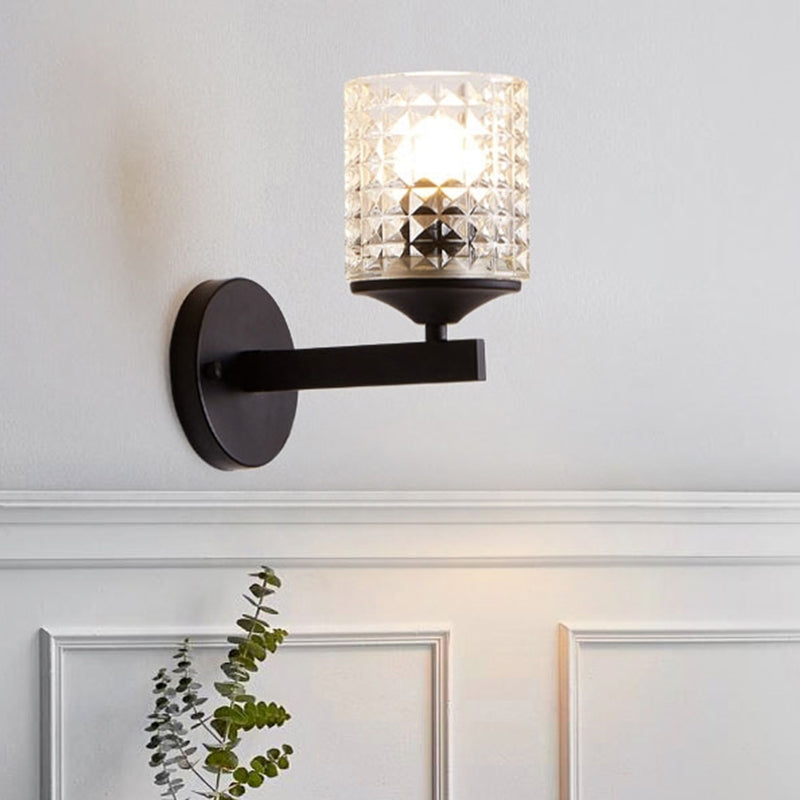 Cylinder Clear Textured Glass Wall Mounted Modern Single Bulb Bedroom Sconce Light in Black/Silver Clearhalo 'Cast Iron' 'Glass' 'Industrial' 'Modern wall lights' 'Modern' 'Tiffany' 'Traditional wall lights' 'Wall Lamps & Sconces' 'Wall Lights' Lighting' 768603