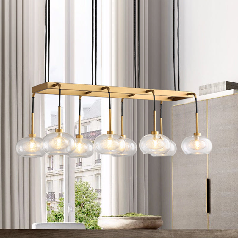 Oval Island Chandelier Lighting Post-Modern Clear Glass 6/8 Lights Gold Led Hanging Lamp with Round/Linear Canopy 8 Gold Linear Clearhalo 'Ceiling Lights' 'Island Lights' Lighting' 769314