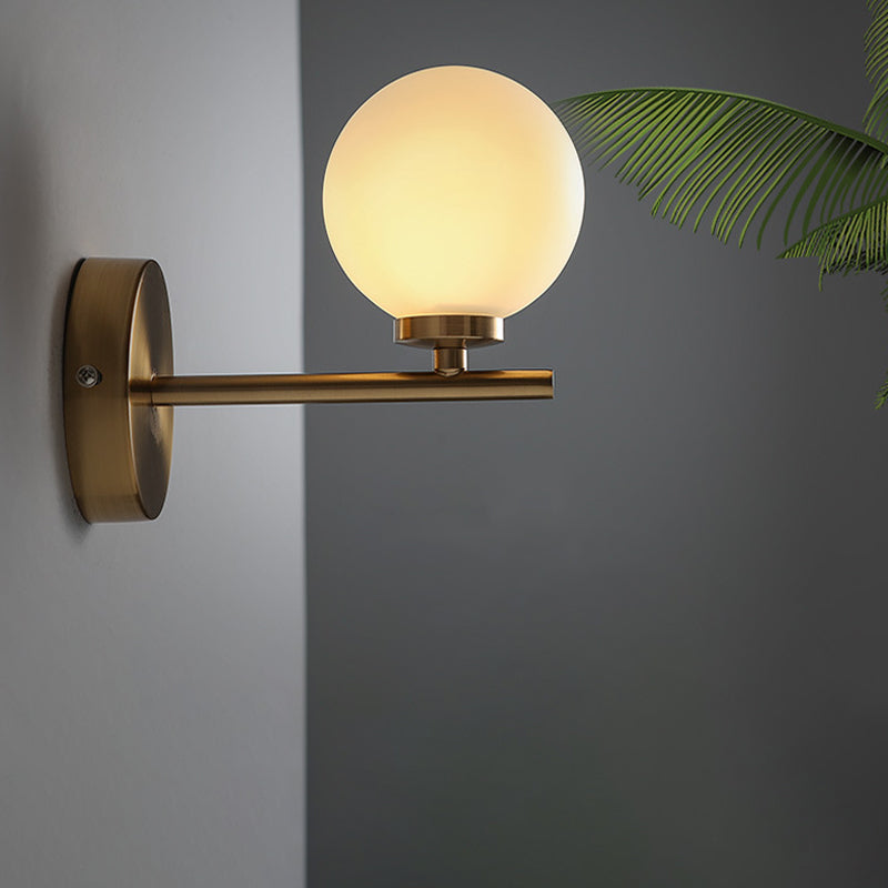 Nordic Style 1/2 Light Wall Sconce Light Gold Orb Wall Mount Lighting with Glass Shade 1.0 Gold Clearhalo 'Cast Iron' 'Glass' 'Industrial' 'Modern wall lights' 'Modern' 'Tiffany' 'Traditional wall lights' 'Wall Lamps & Sconces' 'Wall Lights' Lighting' 770917