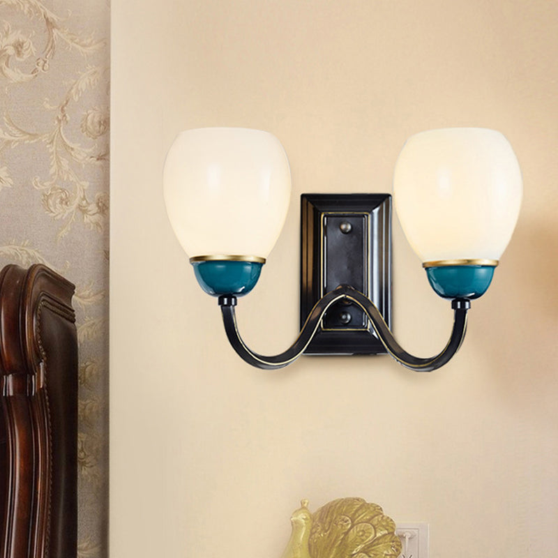 1/2-Head Globe Wall Lighting Fixture Countryside Black and Blue Opal Glass Wall Light Sconce with Curved Arm 2.0 Black-Blue Clearhalo 'Wall Lamps & Sconces' 'Wall Lights' Lighting' 781103