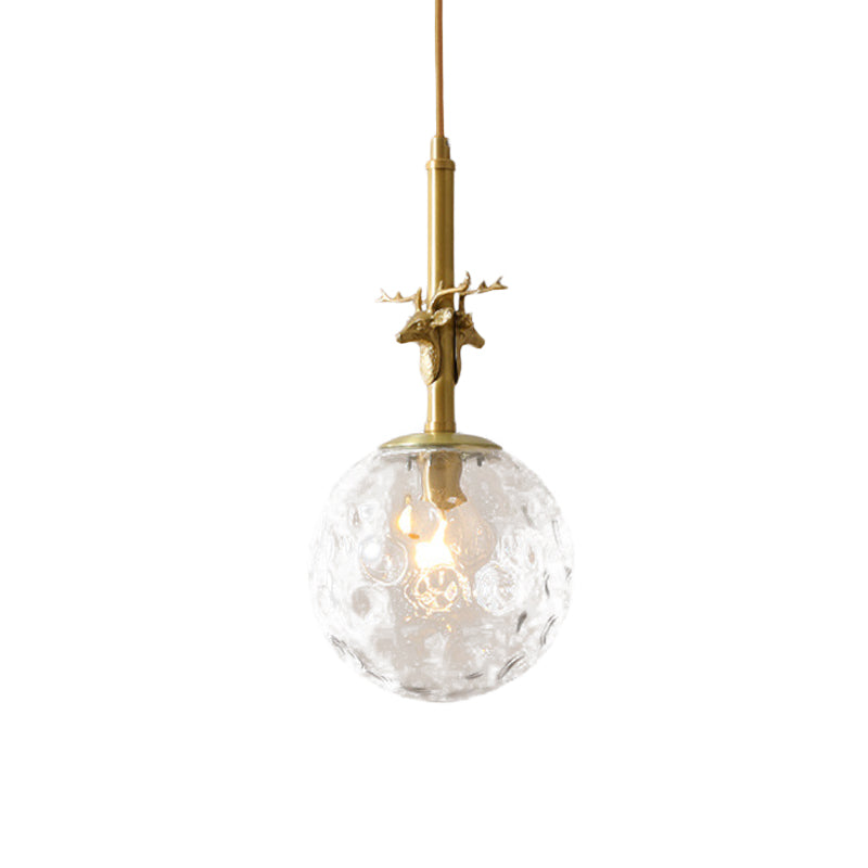 Traditional Sphere Pendulum Light 1 Head Clear Dimpled Glass Hanging Ceiling Lamp in Brass Clearhalo 'Ceiling Lights' 'Close To Ceiling Lights' 'Glass shade' 'Glass' 'Pendant Lights' 'Pendants' Lighting' 782219