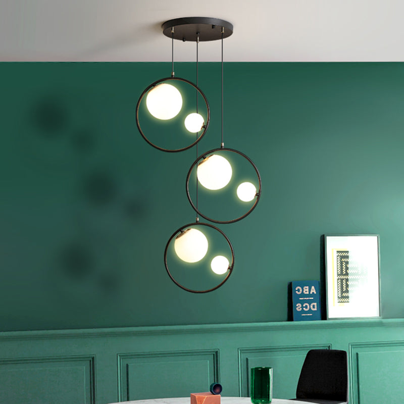 Modernism 6-Light Multi Pendant Black Orb Hanging Ceiling Light with Opal Glass Shade and Ring Black Clearhalo 'Ceiling Lights' 'Glass shade' 'Glass' 'Modern Pendants' 'Modern' 'Pendant Lights' 'Pendants' Lighting' 786860