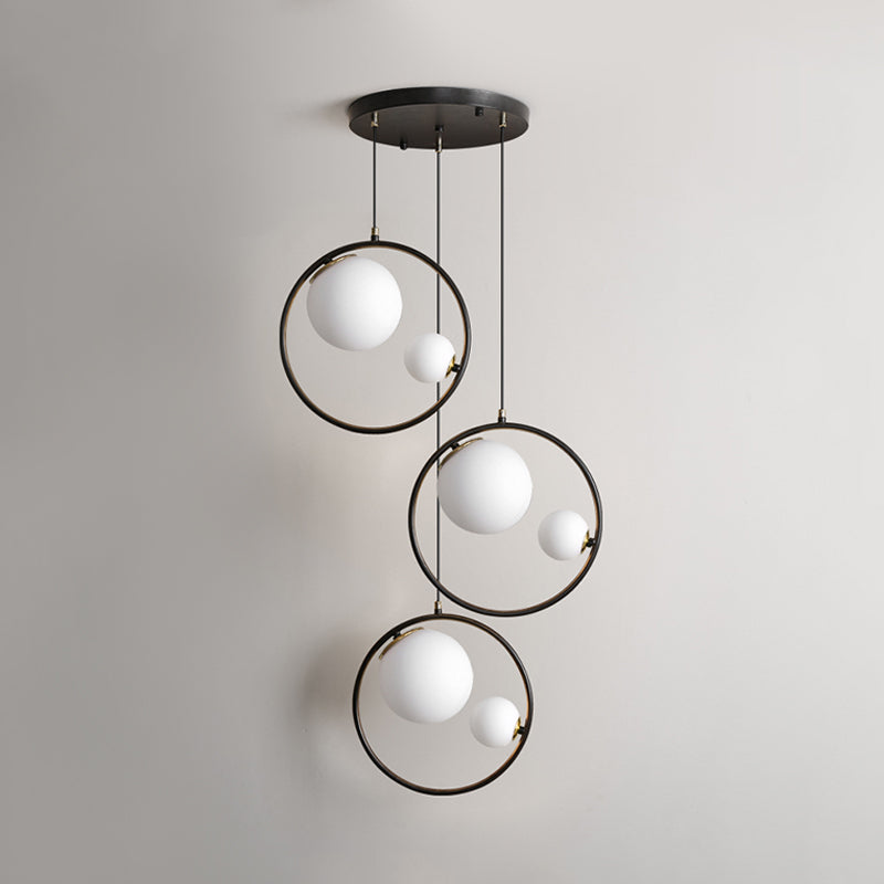 Modernism 6-Light Multi Pendant Black Orb Hanging Ceiling Light with Opal Glass Shade and Ring Clearhalo 'Ceiling Lights' 'Glass shade' 'Glass' 'Modern Pendants' 'Modern' 'Pendant Lights' 'Pendants' Lighting' 786862