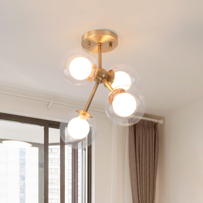 Branching Semi Flush Ceiling Light Postmodernist Transparent Glass 4-Light Bedroom Flush Mount Fixture in Brass Brass Clearhalo 'Ceiling Lights' 'Close To Ceiling Lights' 'Close to ceiling' 'Glass shade' 'Glass' 'Semi-flushmount' Lighting' 786910