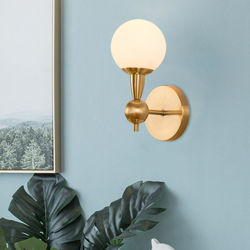 Mid Century 1/2-Bulb Wall Lighting Ideas Brass Orb Shaped Wall Mount Light with Opal Glass Lampshade Clearhalo 'Cast Iron' 'Glass' 'Industrial' 'Modern wall lights' 'Modern' 'Tiffany' 'Traditional wall lights' 'Wall Lamps & Sconces' 'Wall Lights' Lighting' 786966