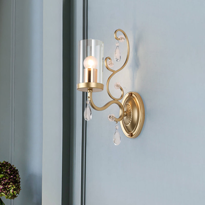 1/2-Bulb Clear Glass Wall Mounted Light Simple Brass Finish Cylinder Wall Lighting Ideas with Crystal Accent 1.0 Brass Clearhalo 'Cast Iron' 'Glass' 'Industrial' 'Modern wall lights' 'Modern' 'Tiffany' 'Traditional wall lights' 'Wall Lamps & Sconces' 'Wall Lights' Lighting' 791066
