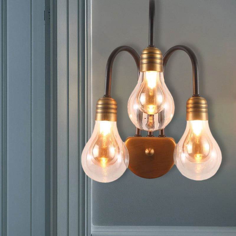 Clear Glass Bulb Wall Lighting Contemporary 1/2/3 Lights Led Wall Sconce Light in Brass with Curved Arm Clearhalo 'Cast Iron' 'Glass' 'Industrial' 'Modern wall lights' 'Modern' 'Tiffany' 'Traditional wall lights' 'Wall Lamps & Sconces' 'Wall Lights' Lighting' 798983