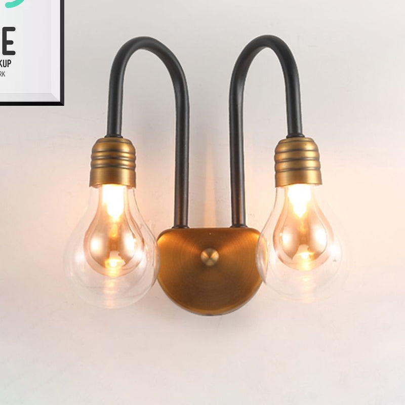 Clear Glass Bulb Wall Lighting Contemporary 1/2/3 Lights Led Wall Sconce Light in Brass with Curved Arm Clearhalo 'Cast Iron' 'Glass' 'Industrial' 'Modern wall lights' 'Modern' 'Tiffany' 'Traditional wall lights' 'Wall Lamps & Sconces' 'Wall Lights' Lighting' 798984