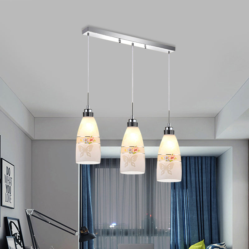3-Light Drop Pendant Minimalist Oblong White Printing Glass Multiple Hanging Lamp with Round/Linear Canopy Clearhalo 'Ceiling Lights' 'Glass shade' 'Glass' 'Pendant Lights' 'Pendants' Lighting' 800736