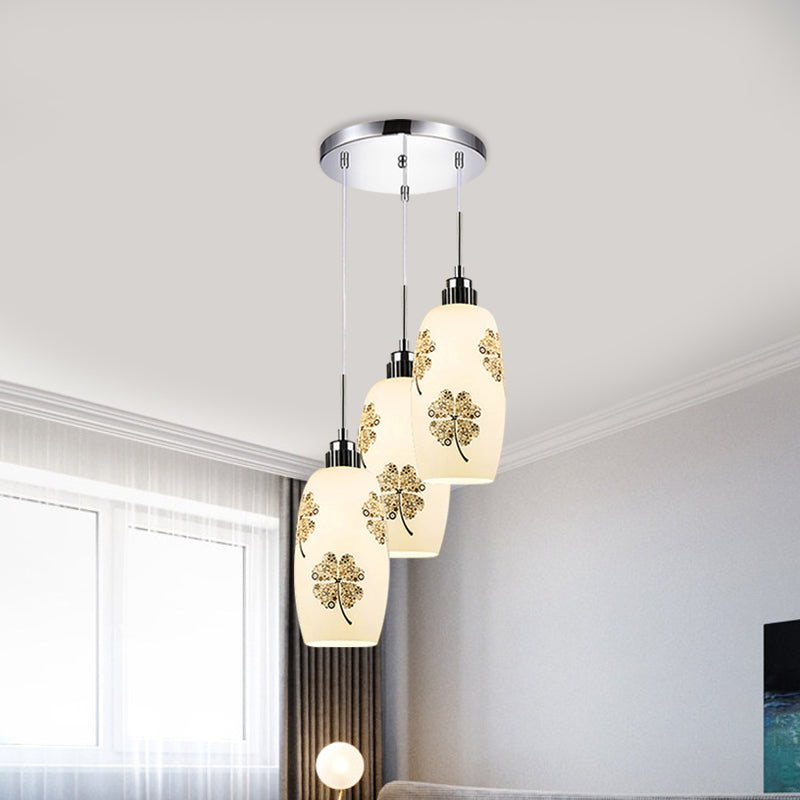 White Frosted Glass Bottle Multi-Pendant Minimalist 3 Lights Restaurant Hanging Ceiling Lamp with Clover Pattern White Clearhalo 'Ceiling Lights' 'Glass shade' 'Glass' 'Pendant Lights' 'Pendants' Lighting' 800755