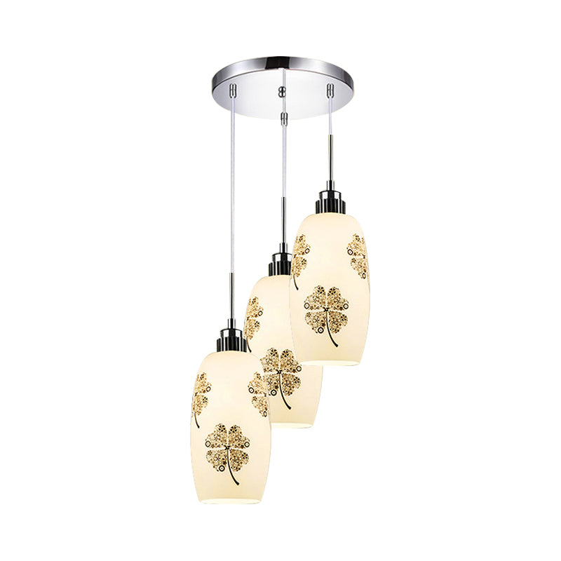 White Frosted Glass Bottle Multi-Pendant Minimalist 3 Lights Restaurant Hanging Ceiling Lamp with Clover Pattern Clearhalo 'Ceiling Lights' 'Glass shade' 'Glass' 'Pendant Lights' 'Pendants' Lighting' 800757