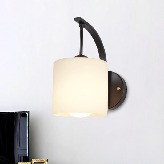 Modernism 1-Light Wall Sconce Black Finish Cylindrical Wall Lamp Fixture with Opal Glass Shade Black Clearhalo 'Cast Iron' 'Glass' 'Industrial' 'Modern wall lights' 'Modern' 'Tiffany' 'Traditional wall lights' 'Wall Lamps & Sconces' 'Wall Lights' Lighting' 800873